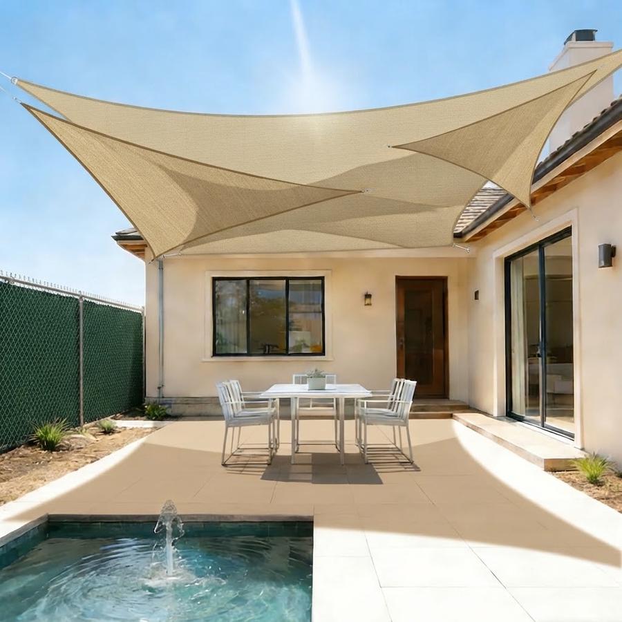 Turquoise square shade sail over a backyard pergola