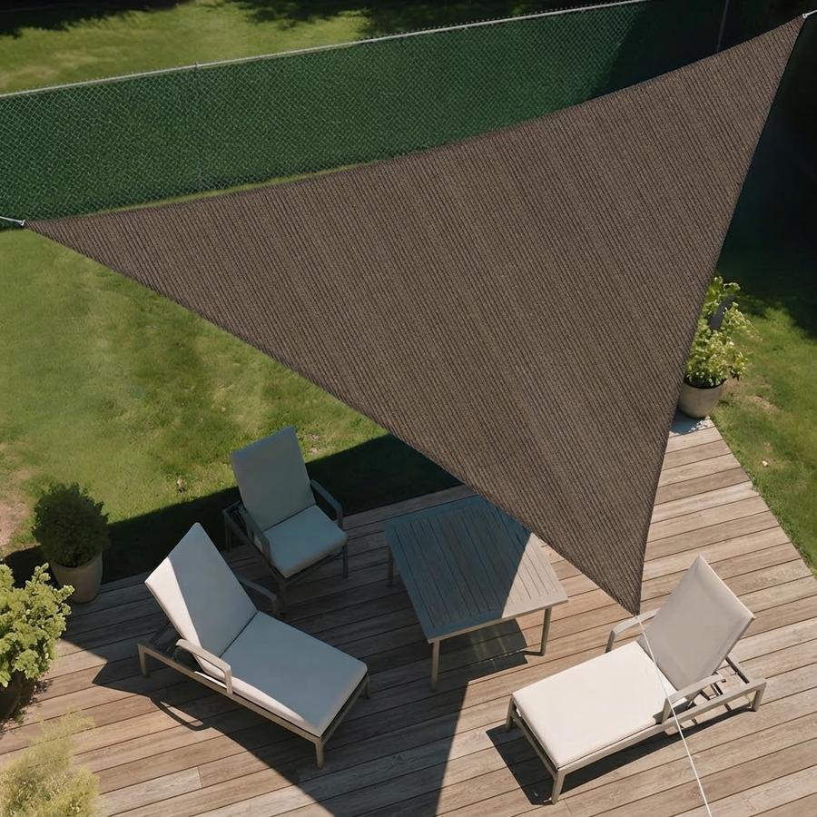 Brown triangle shade sail over a patio corner